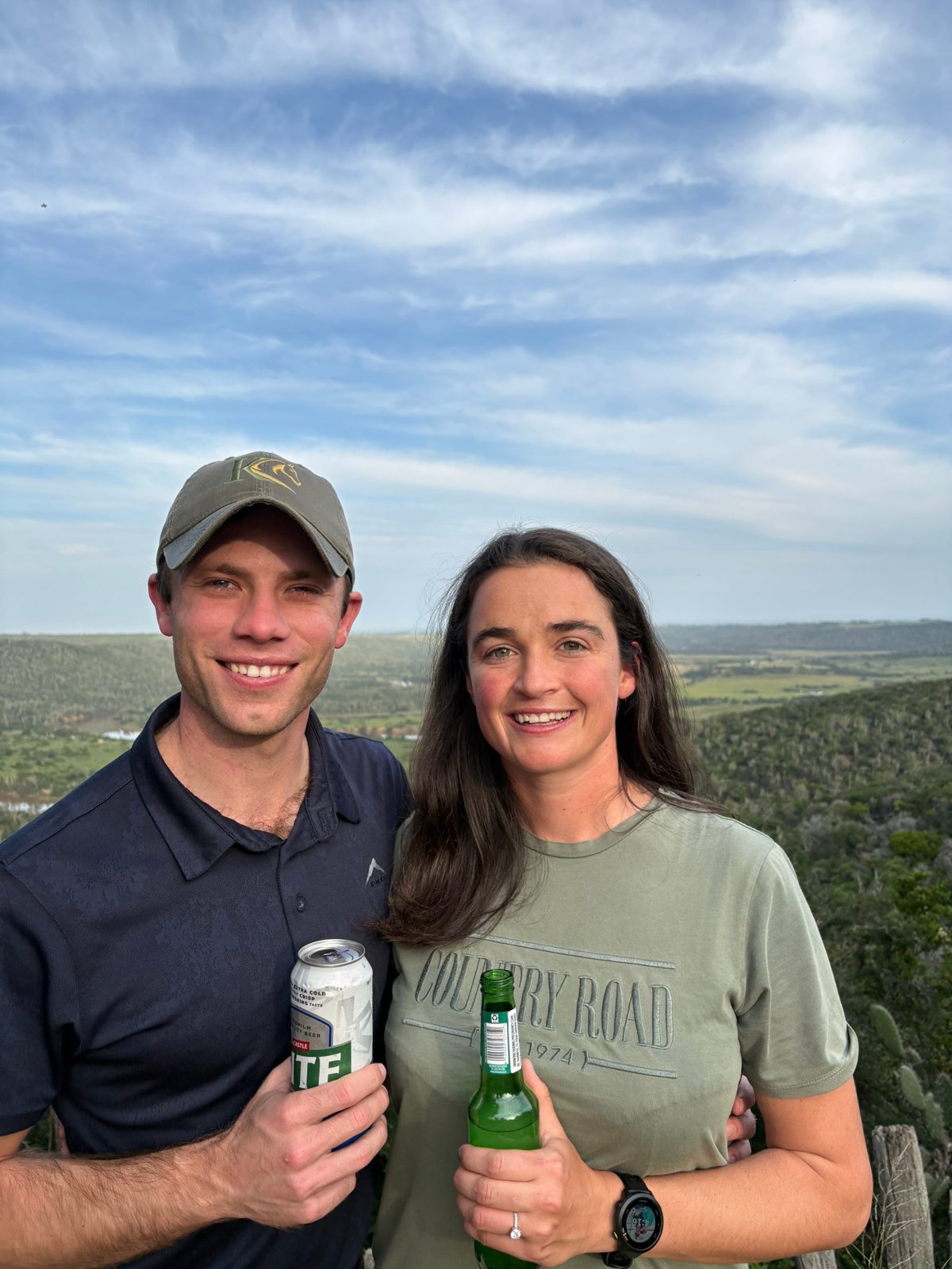 Kirstin and Michael smiling at a lookout
